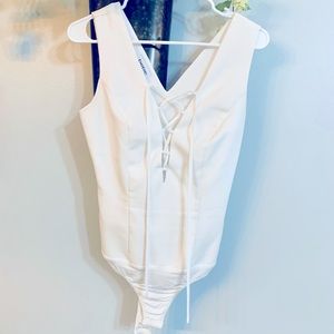 White low cut bodysuit from Bebe
